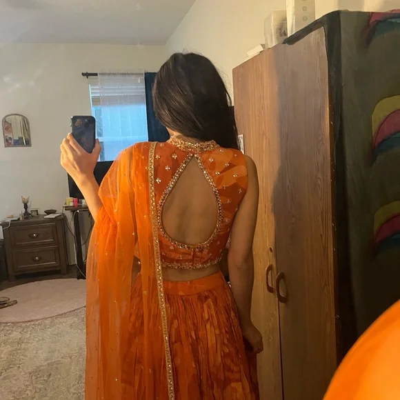 Kalki Elegant Orange Lehenga Set - Picture 3 of 10